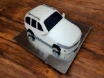 white-suv-stormer-theme-cake