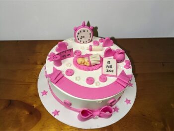 cute-newborn-baby-girl-celebration-cake